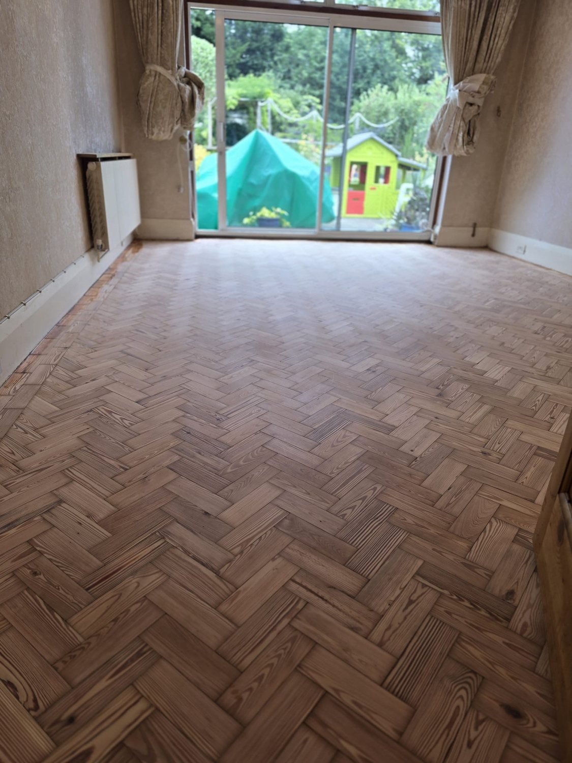 Restored pitch pine parquet floor in a Brixton period home