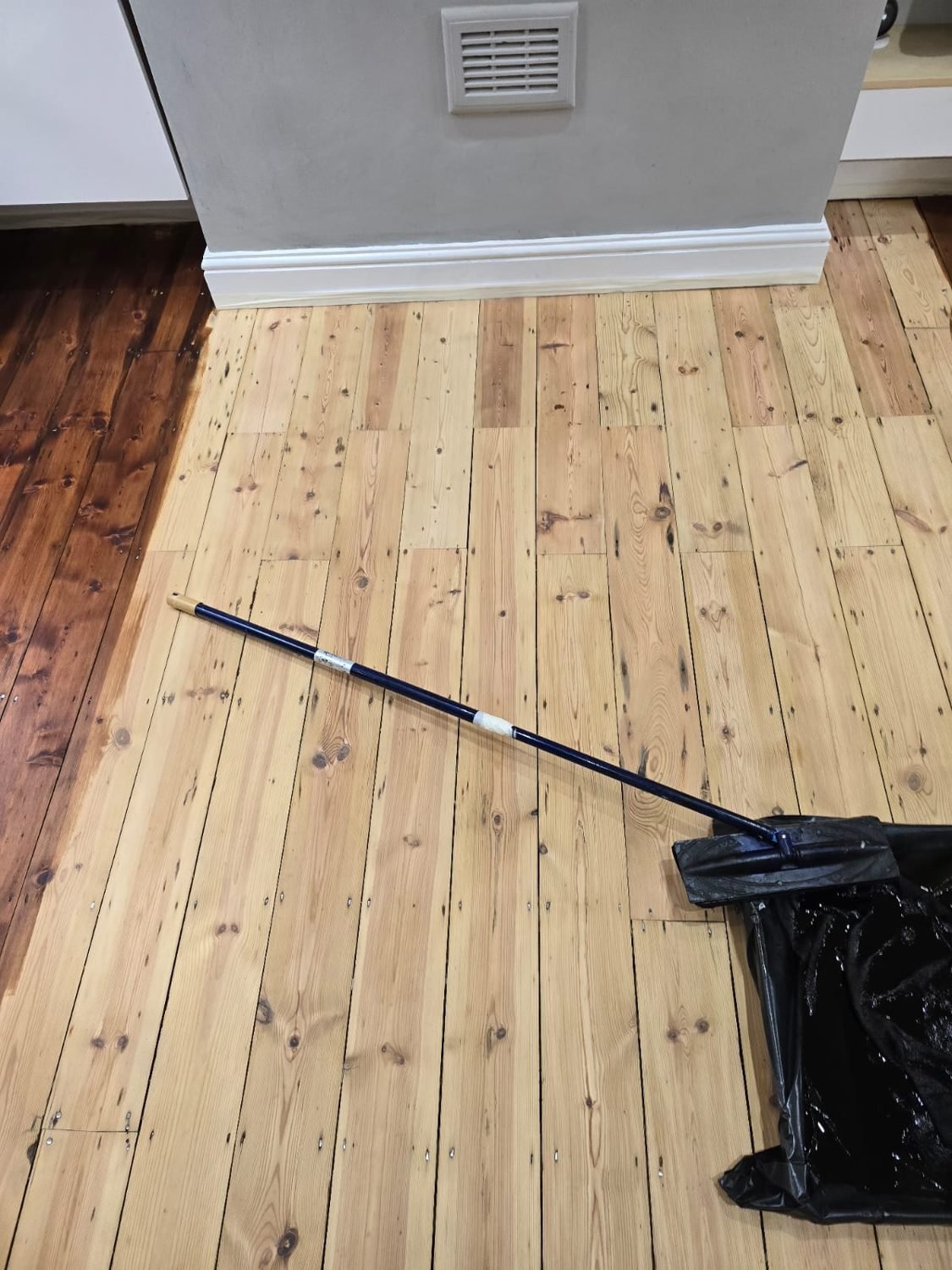 Freshly sanded pine floorboards in a Wandsworth home