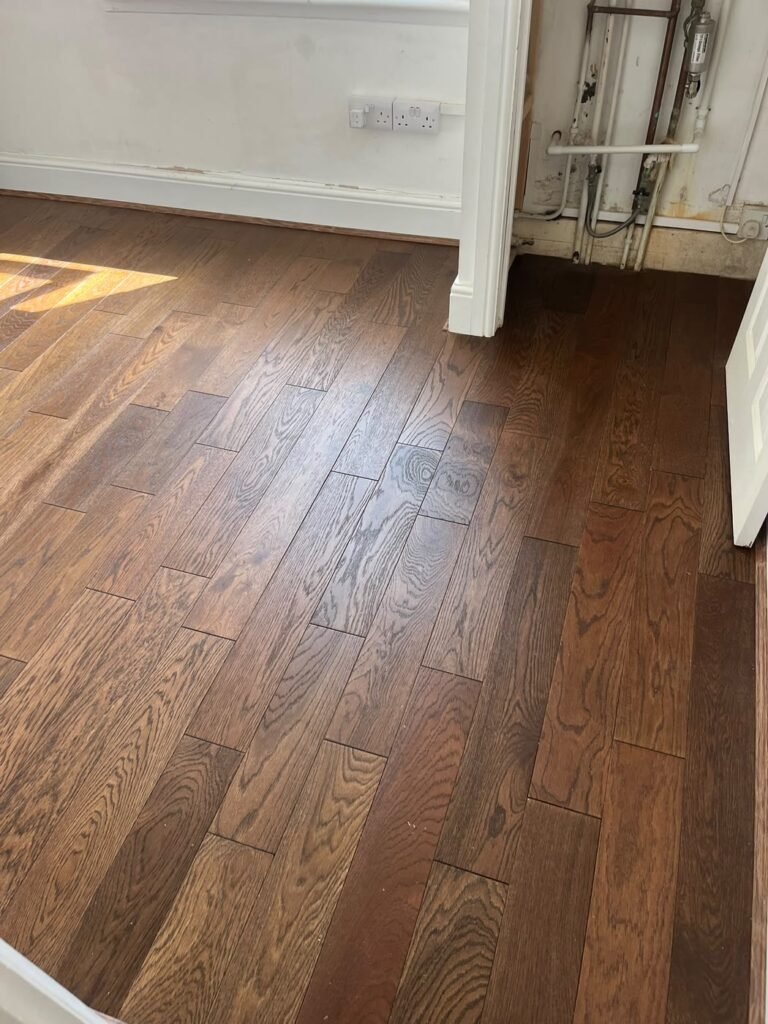 Completed wood floor installation with new beading in North London N4