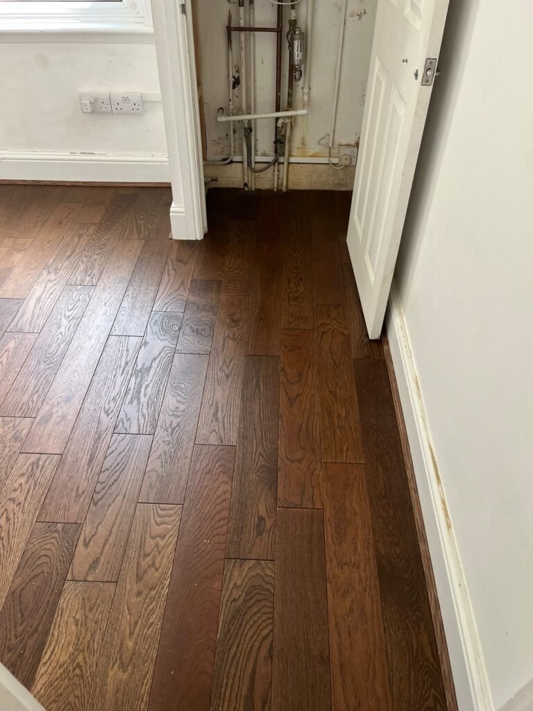 New wood floor continued into the built-in closet