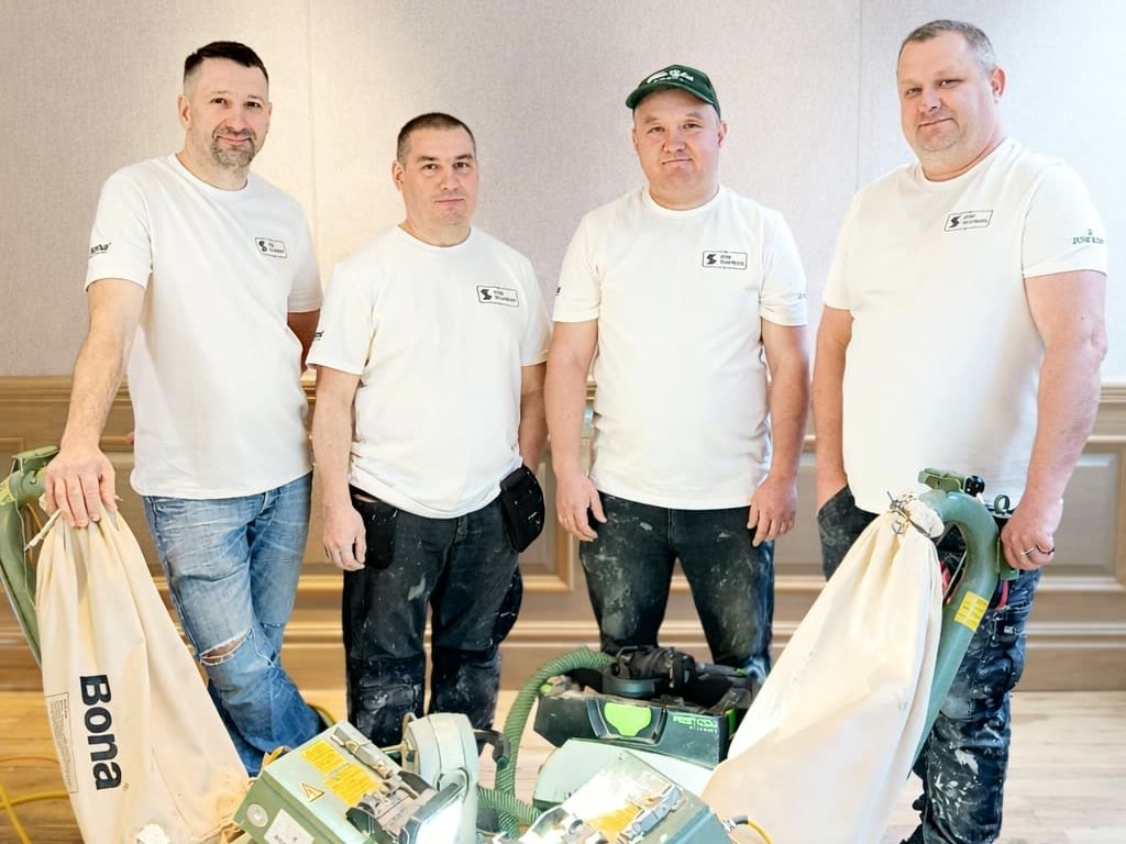 The Step Flooring team with their floor sanding machines